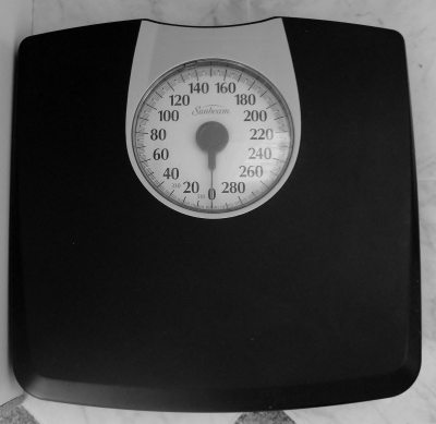 Use a scale to track pounds gained or lost